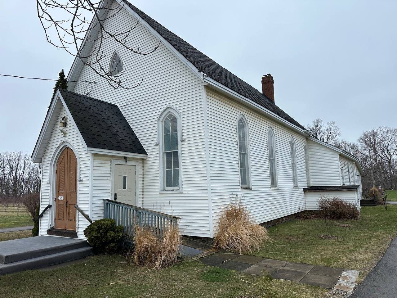 The white wooden church at 1429 Third Avenue Louth